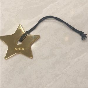 Gold metal Dior charm